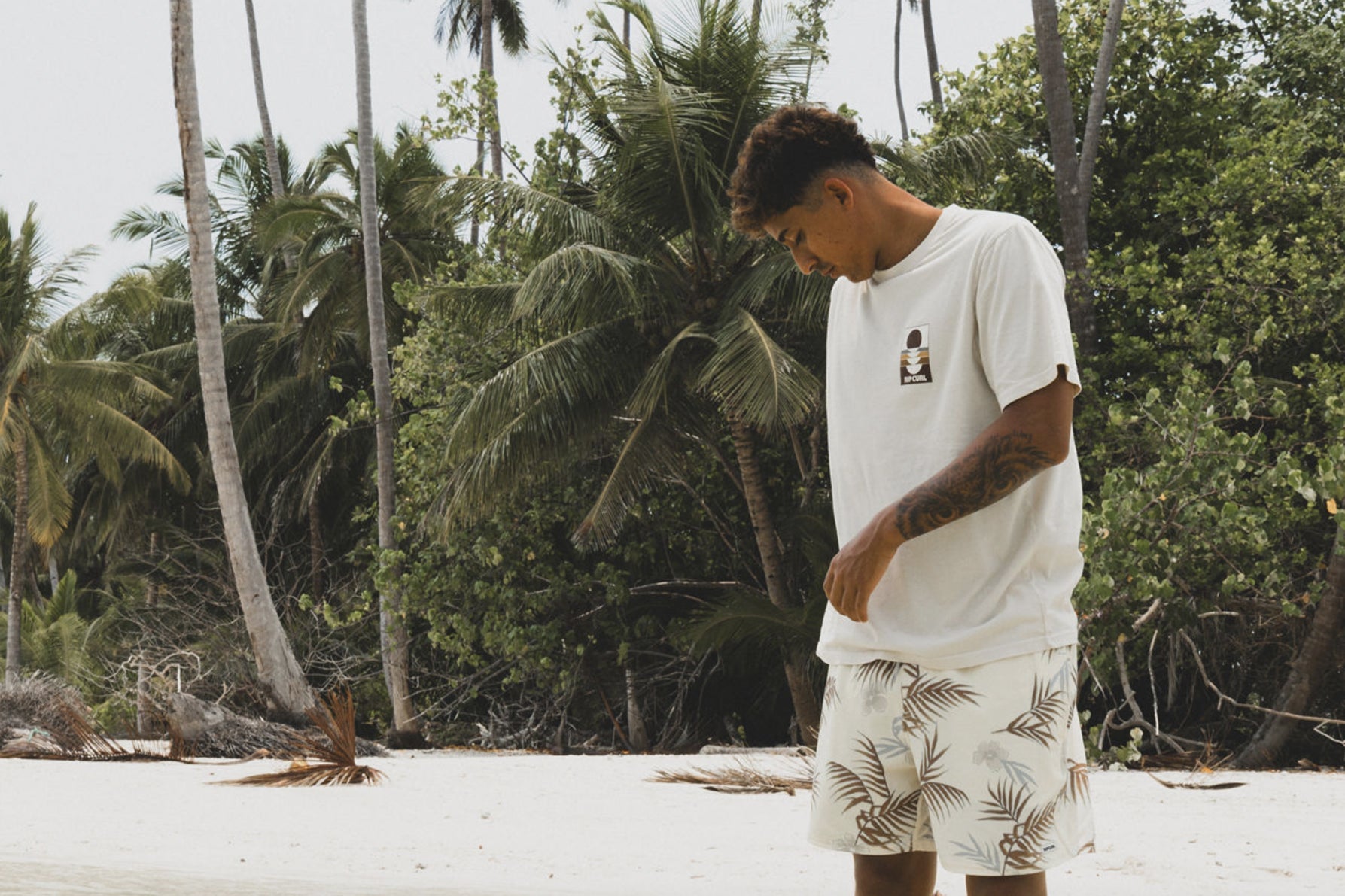 A man standing on the beach