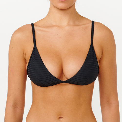 Black bikini top worn by a model on a white background