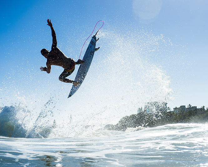 Surfer making a jump