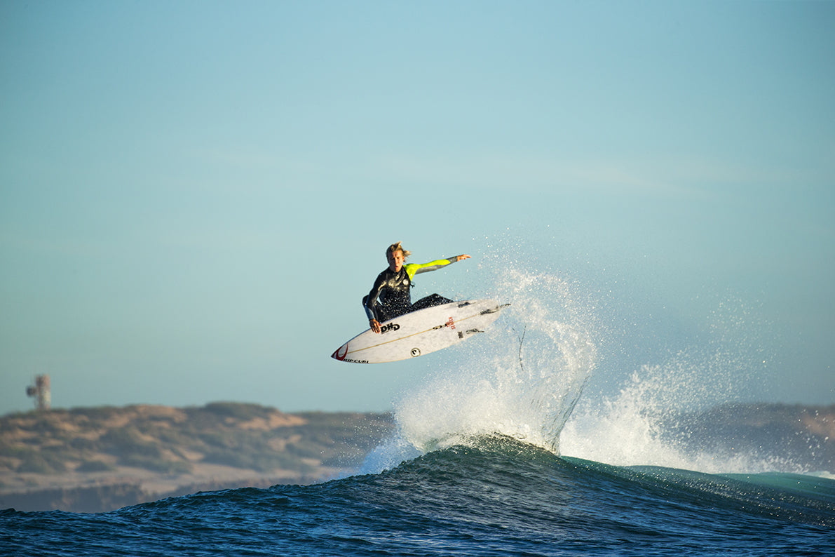 surfer doing an aerial
