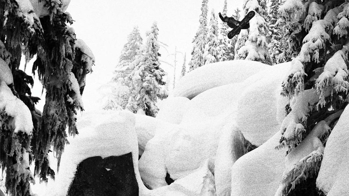 Snowboarder snow boarding in the snow
