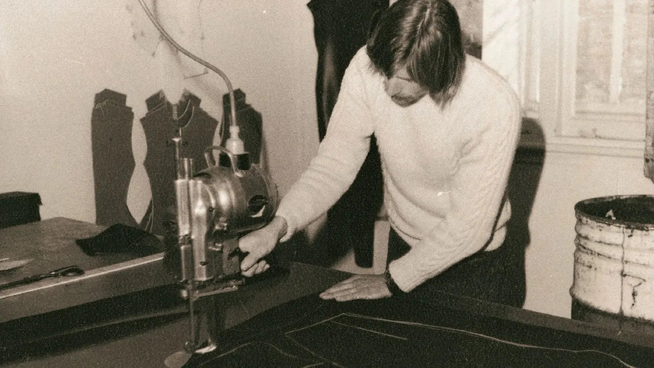 Person operating a machine in a workshop setting
