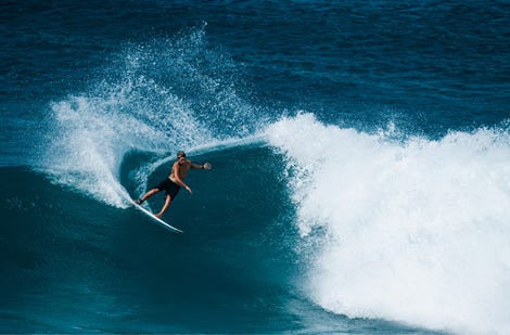 Surfer riding a big wave