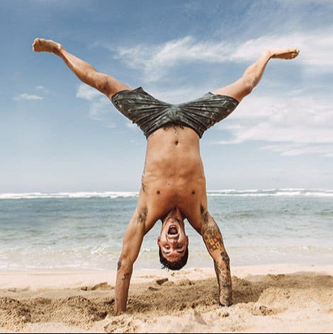 Gabriel Medina playing at beach