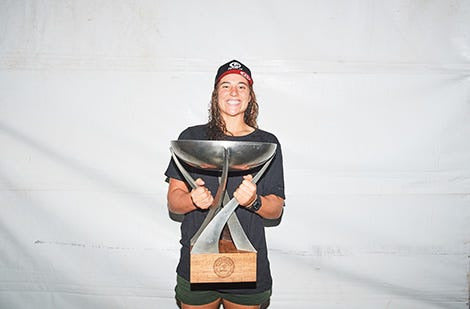 The surfer Tyler Wright with a surf trophy